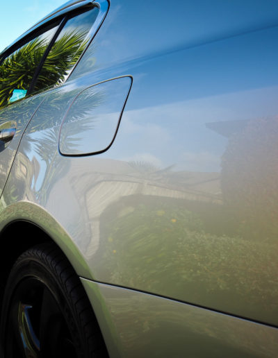 Deep rich gloss in paint work after coating applied on left side of car